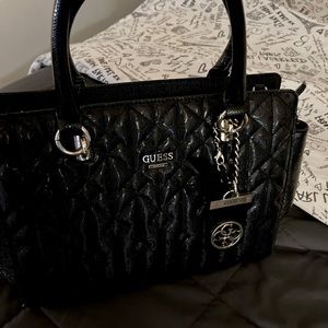 SOLD! Guess purse - black and gold … never used